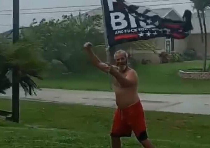 A Man Walked Out Into a Hurricane with an anti-Biden Slogan in the U.S